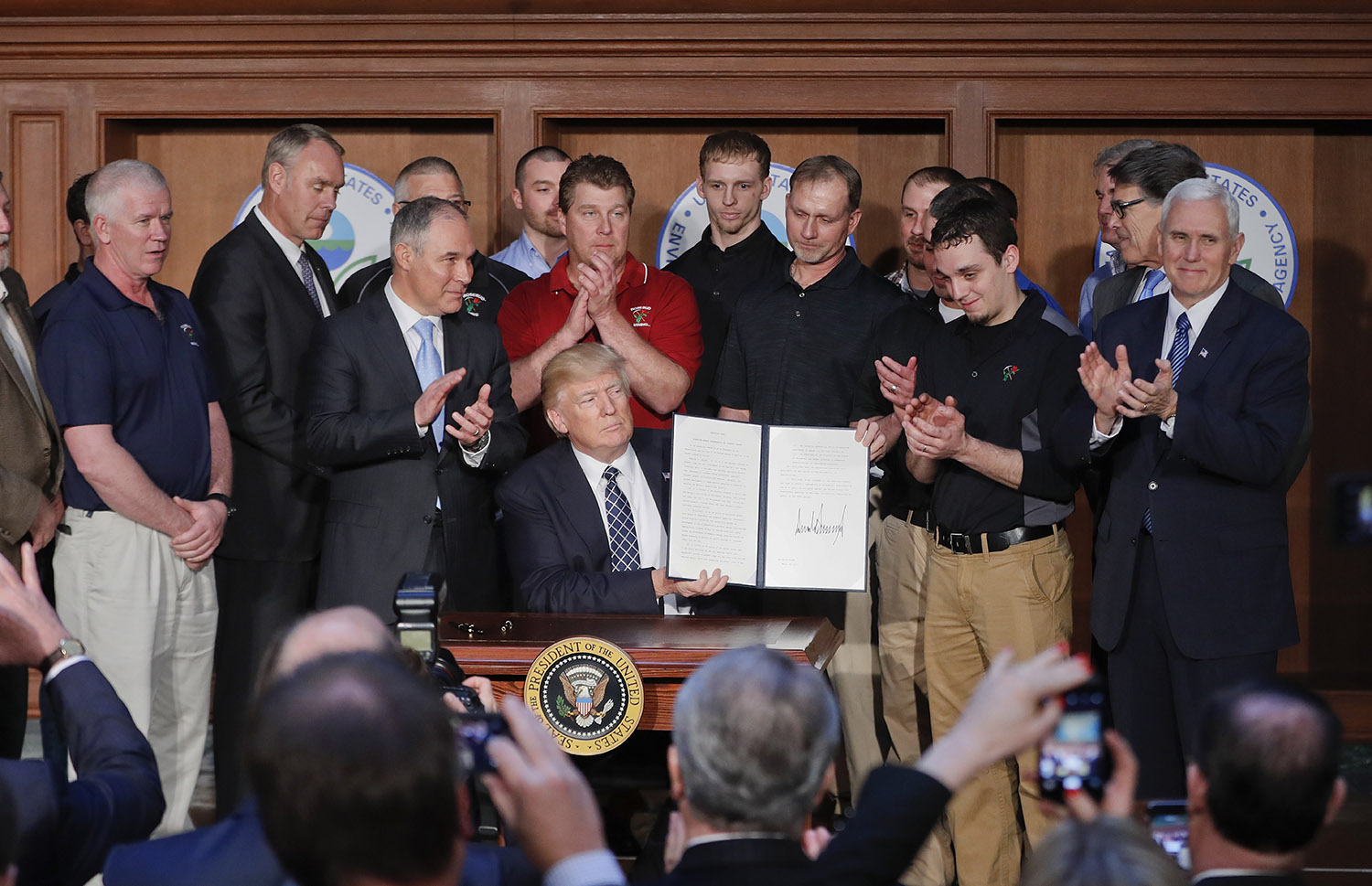 Trump signs executive order, declares end to the ‘war on coal’