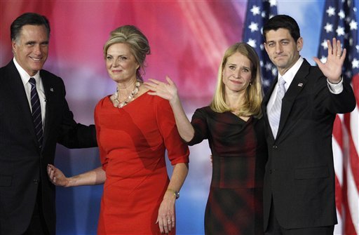 Republican presidential candidate and former Massachusetts Gov. Mitt Romney and his wife Ann Romney, left, and vice presidential candidate, Rep. Paul Ryan, R-Wis., and his wife Janna, right, wave to supporters after Romney conceded the race during his election night rally, Wednesday, Nov. 7, 2012, in Boston. (AP Photo/Stephan Savoia)