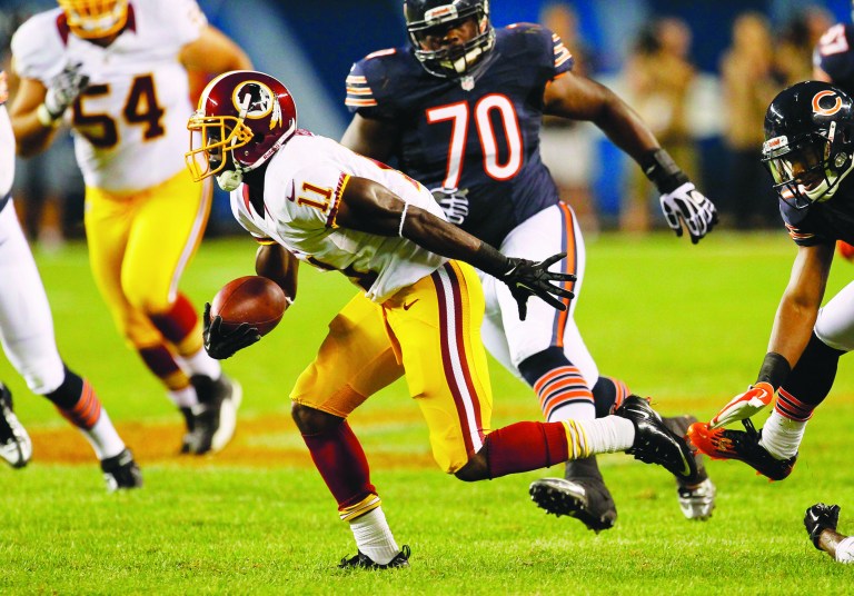 Charles Rex Arbogast/AP
Washington Redskins wide receiver Aldrick Robinson had six catches for 104 yards, including a 49-yard catch and run against Chicago on Saturday.