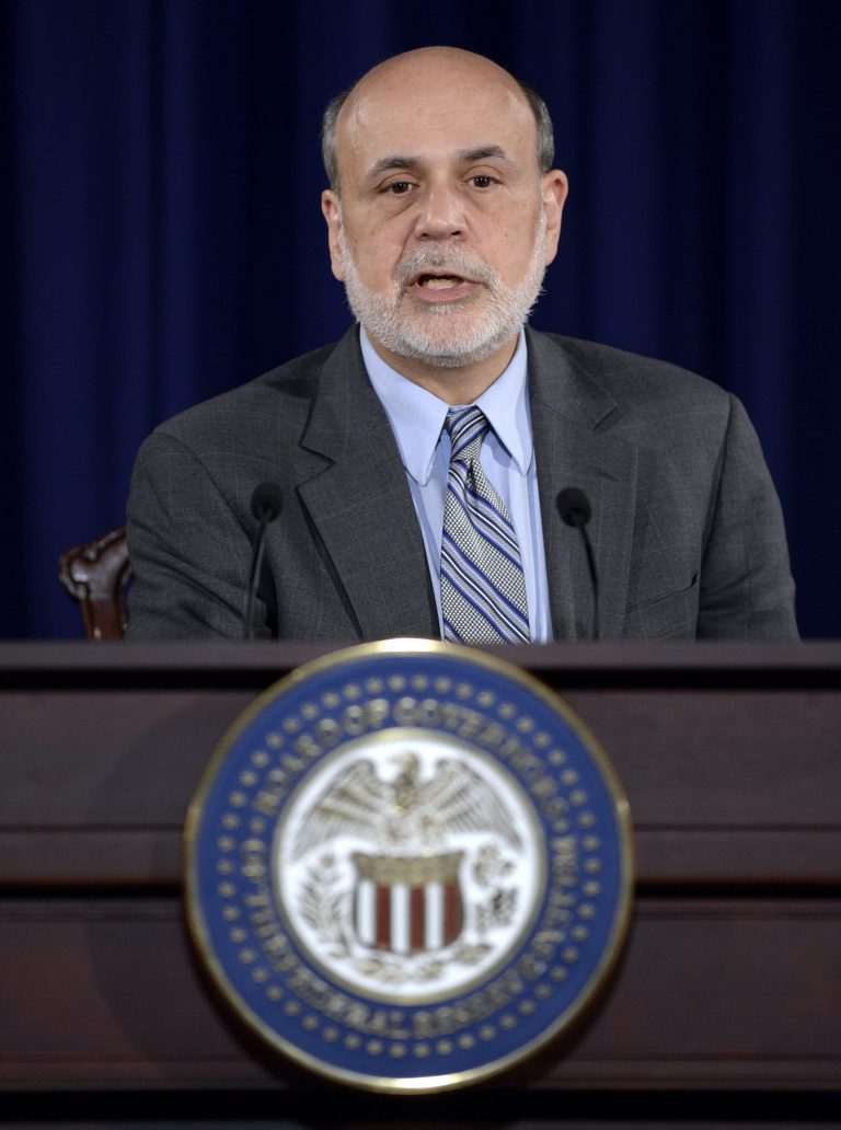   Federal Reserve Chairman Ben Bernanke speaks during a news conference at the Federal Reserve in Washington, Wednesday, Sept. 18, 2013. The Federal Reserve has decided against reducing its stimulus for the U.S. economy because its outlook for growth has dimmed in the past three months. The Fed said it will continue to buy $85 billion a month in bonds while it awaits conclusive evidence that the economy is strengthening. (AP Photo/Susan Walsh)  