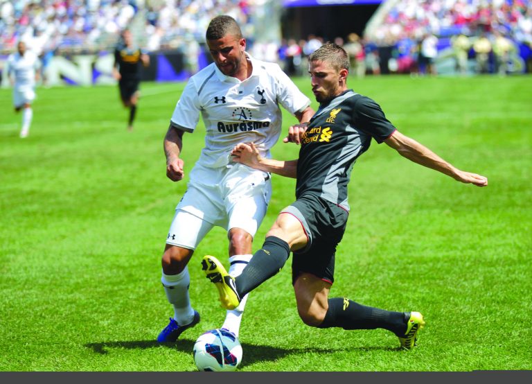 Luis M. Alvarez/AP
Kyle Walker, left, and Tottenham Hotspur had few scoring chances against Fabio Borini and Liverpool in a friendly Saturday at M&T Bank Stadium in Baltimore.