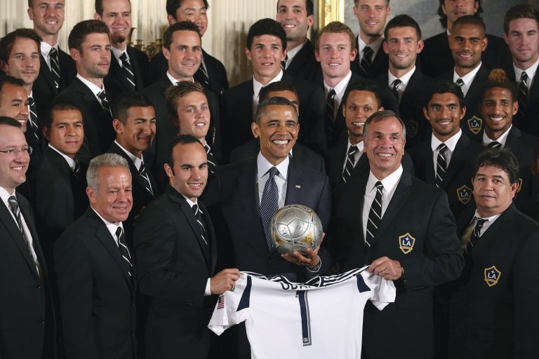 Chip Somodevilla/Getty Images
President Obama poses with players and coaches from the Los Angeles Galaxy at the White House. Obama invited the team to Washington to celebrate its MLS Cup victory.