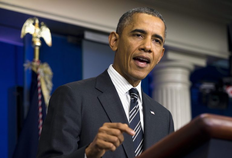  President Barack Obama gestures while making a statement regarding the budget fight in Congress and foreign policy challenges, Friday, Sept. 27, 2013, in the James Brady Press Briefing Room of the White House in Washington. The president said the debt ceiling breach far worse than a government shutdown and would effectively shutter economy. (AP Photo/ Evan Vucci)  
