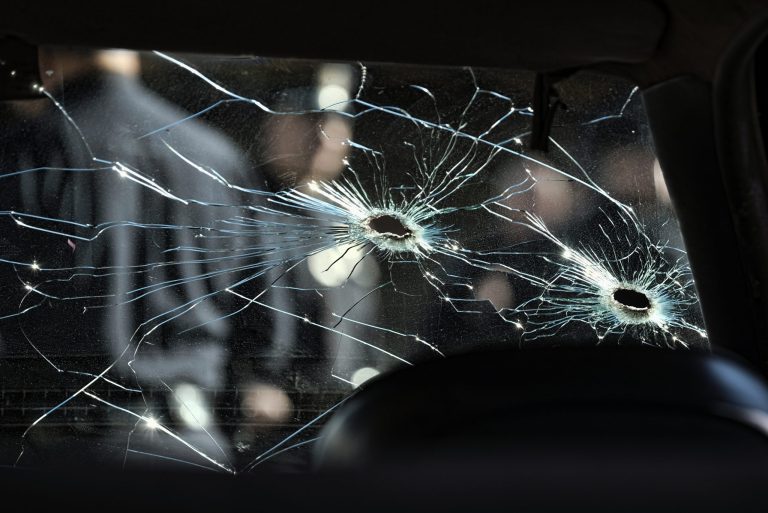 An inside view of a bullet ridden Los Angeles police department patrol car windshield is seen while on display at the North Hollywood police station prior to a ceremony marking the 20th anniversary of what is knows as the North Hollywood shootout in Los Angeles on Tuesday, Feb. 28, 2017. (AP Photo/Richard Vogel)