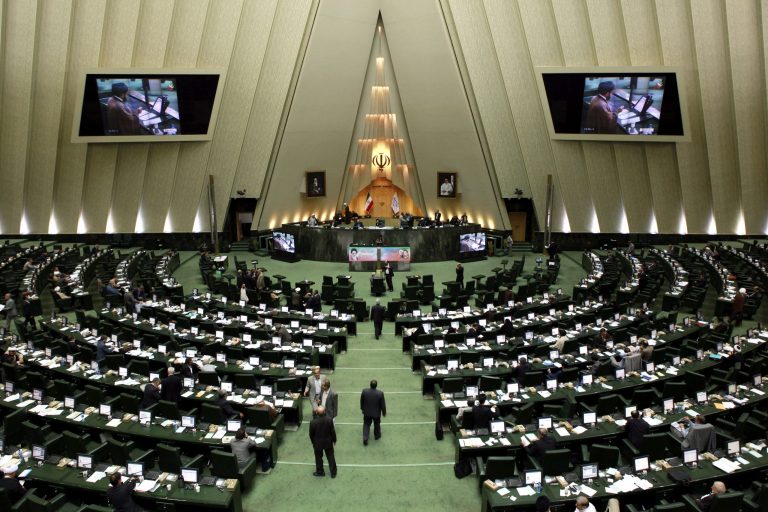   This Aug. 28, 2013, photo, shows a general view of Iran's parliament in Tehran. The U.S. has concluded that nearly half of Iran's monthly earnings from crude oil exports are accumulating in accounts overseas because of sanctions that restrict Tehran's access to the money. The estimates, provided to The Associated Press by a senior U.S. official and never released before, are the latest indication that new sanctions imposed in February are deepening Iran's economic distress and making it increasingly difficult to access billions of dollars in vital oil revenues. (AP Photo/Ebrahim Noroozi)  