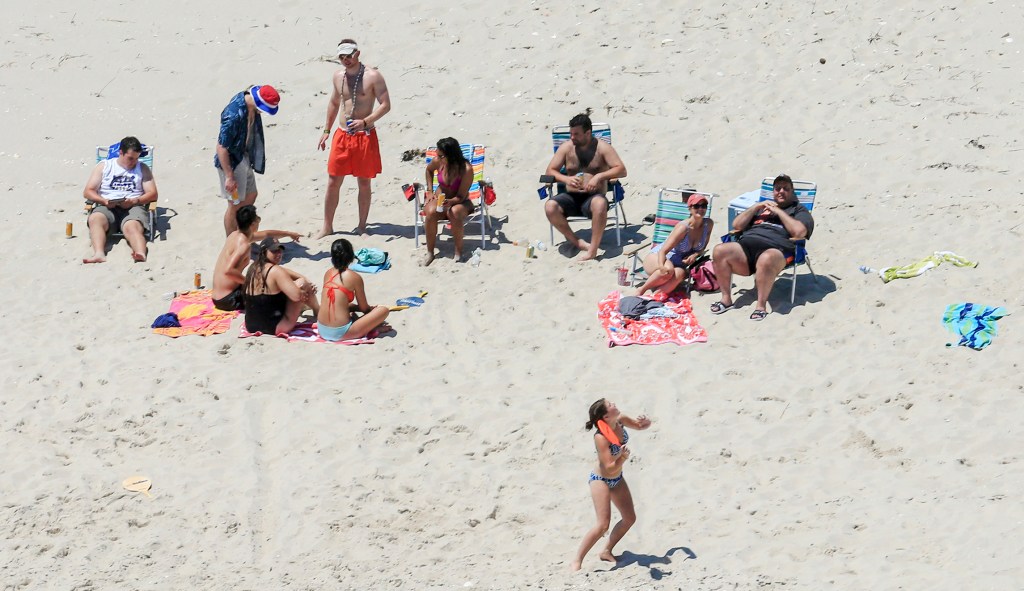 Christie reopens New Jersey beaches, doesn’t apologize