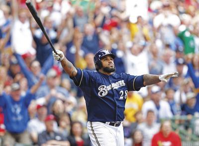 Jeffrey Phelps/AP
Prince Fielder hit .299 with 38 home runs and 120 RBI last season while leading the Brewers to the playoffs.