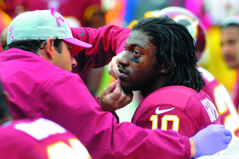 Washington Redskins quarterback Robert Griffin III suffered a concussion in Sunday's game against the Atlanta Falcons. (AP photo)