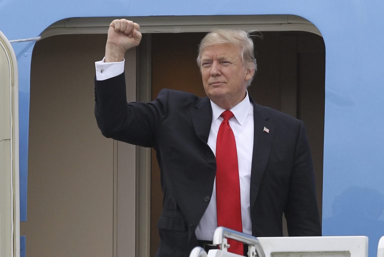 President Trump, who self-funded much of his 2016 campaign, took the stage Friday night in his first official appeal to mega donors of the Republican National Committee. (AP Photo/Luis M. Alvarez)