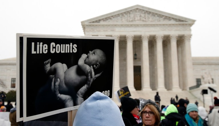 Friday is the 45th anniversary of the Roe v. Wade Supreme Court decision legalizing abortion. It also marks the 44th anniversary of the March for Life protesting that decision. (AP Photo/Alex Brandon)