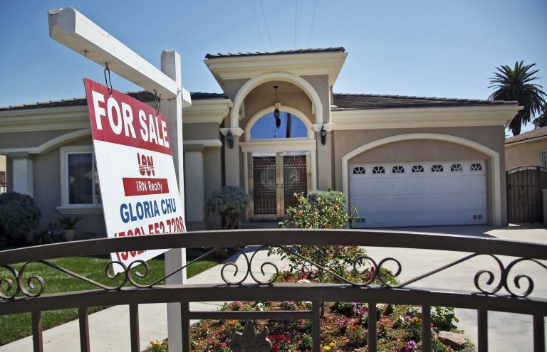 A for sale sign is posted on a home in Monterey Park, Calif. Thursday, Sept. 11, 2014. The number of California homes sold in August fell to the lowest level in four years as a supply crunch pushed prices higher and kept homes out of reach for many buyers. The real estate research firm CoreLogic DataQuick reported Thursday that around 37,000 houses and condos were sold. (AP Photo/ Nick Ut )