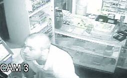 Polo-wearing burglar sought in grocery break-in