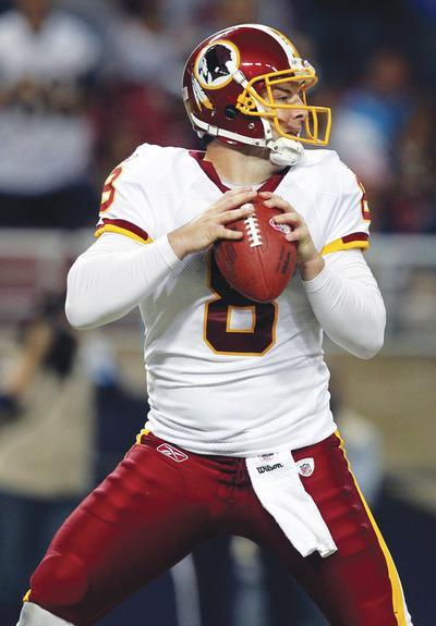 Jeff Roberson/AP
Redskins quarterback Rex Grossman has thrown at least one interception in three straight games and has five on the season.