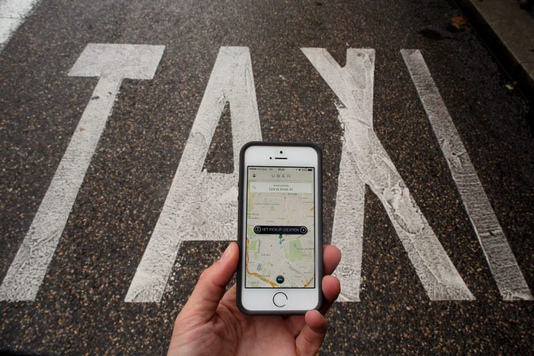 A consulting firm sent riders out in poor Queens and Brooklyn neighborhoods to test UberX, versus taxis and livery cabs. (Getty Images)