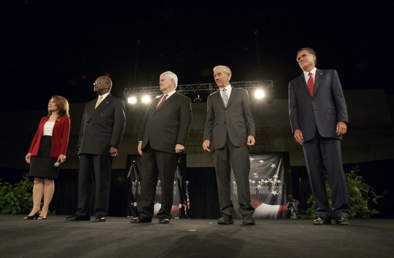 Republican presidential candidates, from left, Rep. Michele Bachmann, R-Minn., businessman Herman Cain, former Rep. Newt Gingrich, Rep. Ron Paul, R-Texas, and former Massachusetts Gov. Mitt Romney pose before the American Principles Project Palmetto Freedom Forum Monday, Sept. 5, 2011, in Columbia, S.C.
