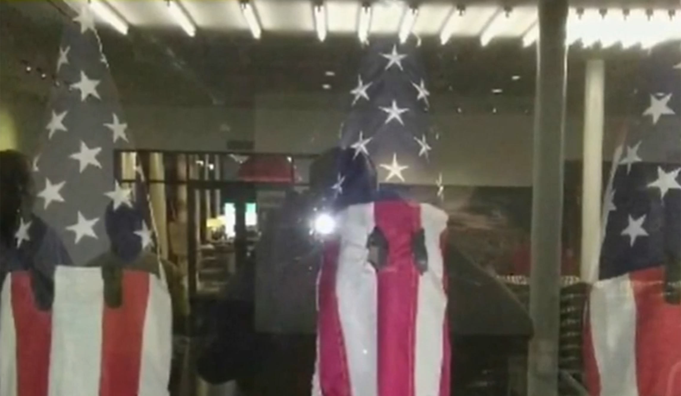 Miami art professor creates KKK hoods out of American flags