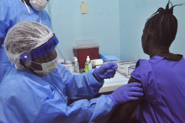 A large-scale human trial of two potential Ebola vaccines got under way in Liberia's capital Monday, part of a global effort to prevent a repeat of the epidemic that has now claimed nearly 9,000 lives in West Africa. (AP Photo)