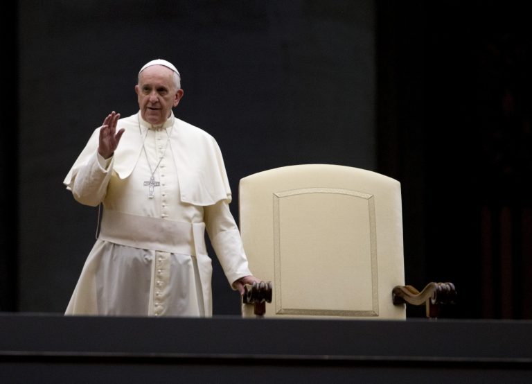 Pope Francis arrives for a vigil in St. Peter's Square at the Vatican, Saturday, Oct. 4, 2014. Pope Francis on Sunday opens a two-week meeting of bishops and cardinals from around the world aimed at making the church's teaching on family life, marriage, sex, contraception, divorce and homosexuality, relevant to today's Catholic families. The pre-synod debate has been dominated by mudslinging between liberals and conservatives over divorce and remarriage, but there are many more issues up for discussion. (AP Photo/Alessandra Tarantino)