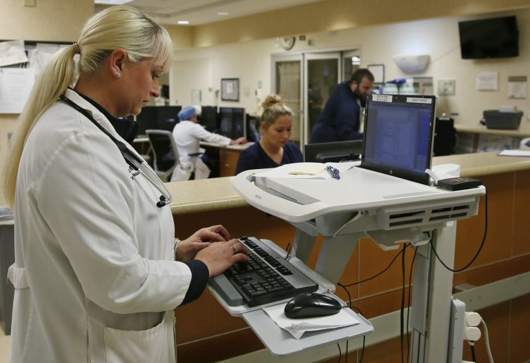 HHS report finds that states that expanded Medicaid have more enrollees who are healthy. (AP Photo/Sue Ogrocki)