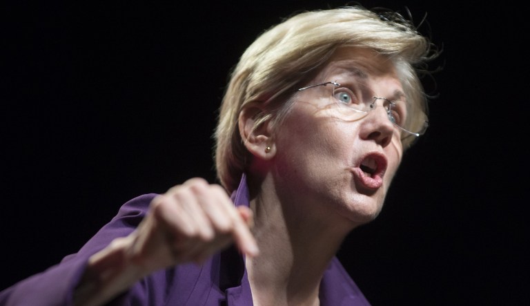Massachusetts Sen. Elizabeth Warren speaks at the Phoenix Convention Center during the Netroots Nation convention Friday, July 17, 2015, in Phoenix. Warren on Friday pressed the 2016 presidential contenders to curb the influence of Wall Street banks, as she seeks to leave her imprint on the agenda of Hillary Rodham Clinton and rest of the Democratic field. (Cheryl Evans/The Arizona Republic via AP) MARICOPA COUNTY OUT; MAGS OUT; NO SALES; MANDATORY CREDIT