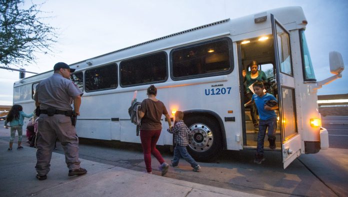 Migrants are released at a Greyhound Bus station in Phoenix, Arizona on May 28. 