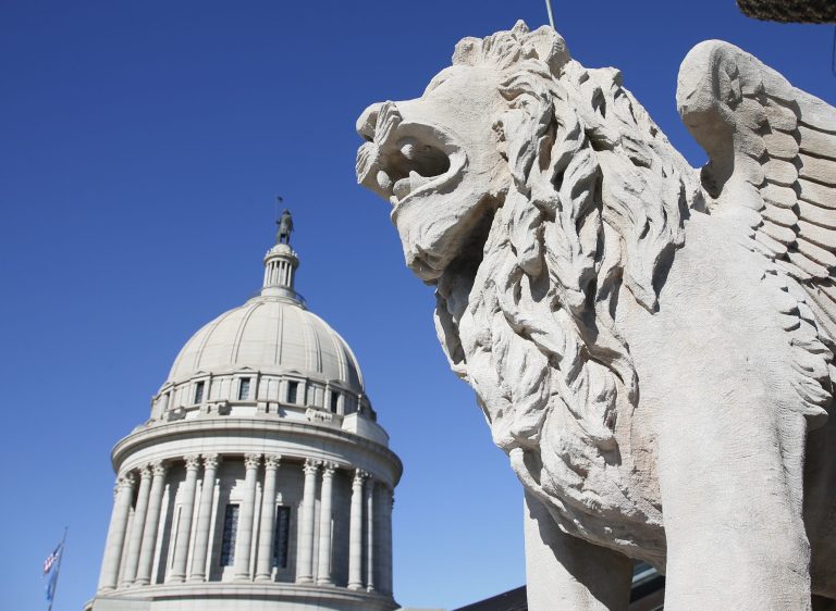 A restored limestone chimera is pictured in front of the state Capitol dome in Oklahoma City, as workers continue restorations Tuesday, Oct. 24, 2017. (AP Photo/Sue Ogrocki)
