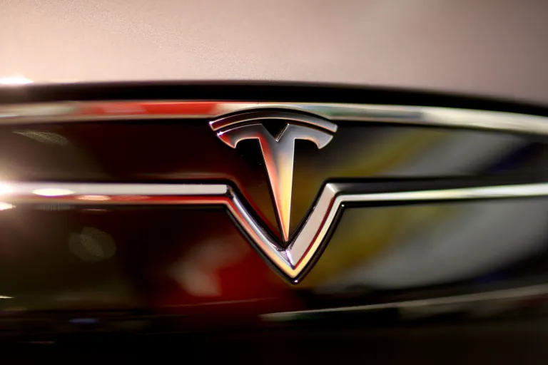 Tesla Motors, the electric-car maker that has seen its stock advance more than sevenfold in the past year, will spend as much as $5 billion on a new battery factory so it can make more affordable cars.  (Photo by Joe Raedle/Getty Images)