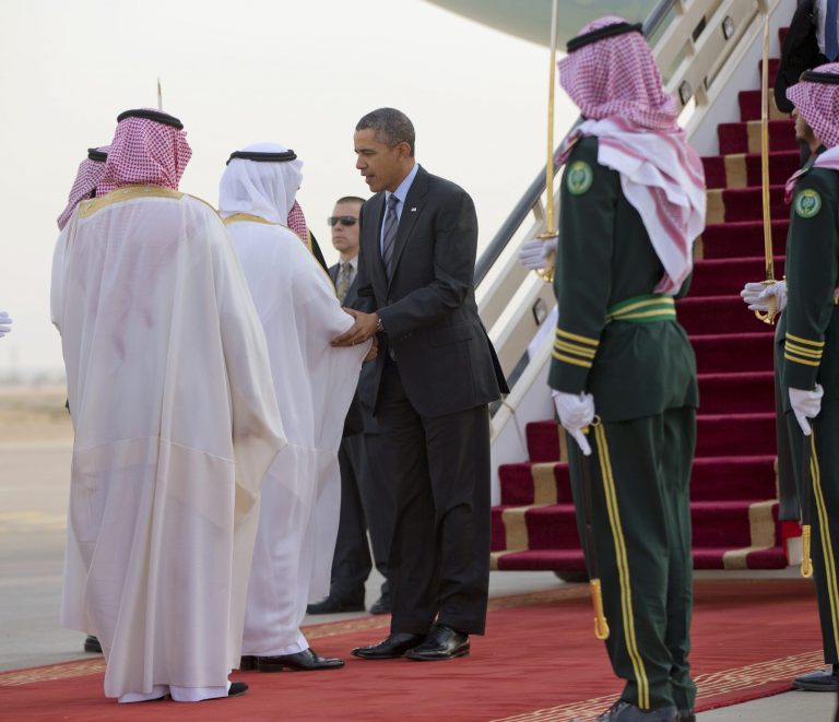 President Obama is greeted by members of the Saudi delegation upon his arrival on Air Force One at King Khalid International airport in Riyadh, Saudi Arabia, on Friday. (AP Photo/Pablo Martinez Monsivais)