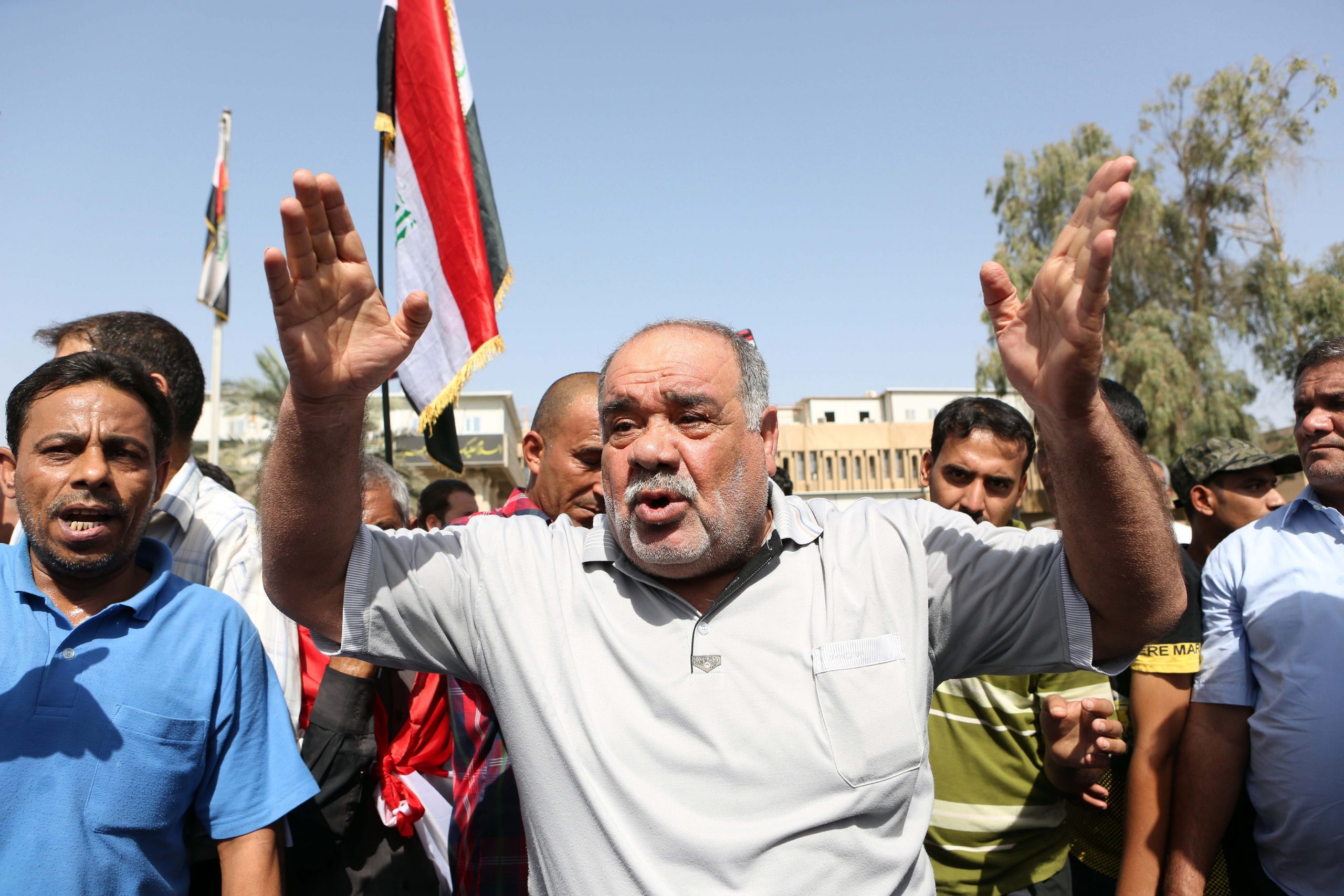 To stem extremists, Iraq to reduce Baghdad’s power
