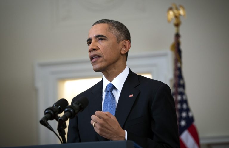 President Obama speaks in the Cabinet Room of the White House in Washington, Wednesday, Dec. 17, 2014, to announce the U.S. will end its outdated approach to Cuba that has failed to advance U.S. interests. (AP Photo/Doug Mills)