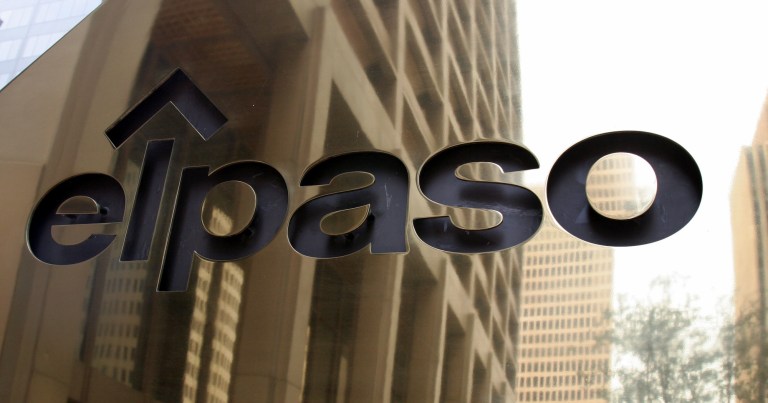   FIlE - In this May 26, 2005, file photo, El Paso Corp.'s Houston headquarters building is reflected in its logo in in downtown Houston. A Delaware judge is approving a $110 settlement in a shareholder lawsuit challenging Kinder Morgan Inc.'s $21 billion acquisition of El Paso Corp., on Monday, Dec. 3, 2012, a deal that created the country's largest natural gas pipeline operator. (AP Photo/Pat Sullivan, file)  