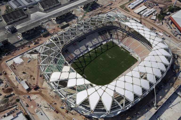 FILE - This Dec. 10, 2013 file photo shows an aerial view of the Arena da Amazonia stadium in Manaus, Brazil. A worker was injured in an accident outside this World Cup stadium, local organizers said Friday, Feb. 7, 2014. Organizers in charge of the stadium's construction said the worker was hurt while dismantling a crane that was used to install the roof. (AP Photo/Renata Brito, File)