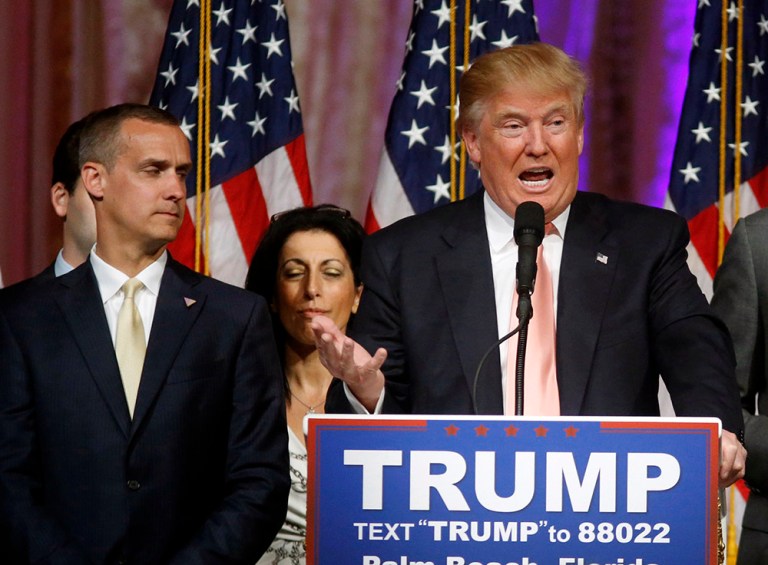 Republican presidential candidate Donald Trump speaks to supporters at his primary election night event at his Mar-a-Lago Club. At left is his campaign manager Corey Lewandowski. (AP Photo/Gerald Herbert)