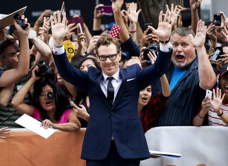 Actor Benedict Cumberbatch poses for photographs on the red carpet for the new movie 