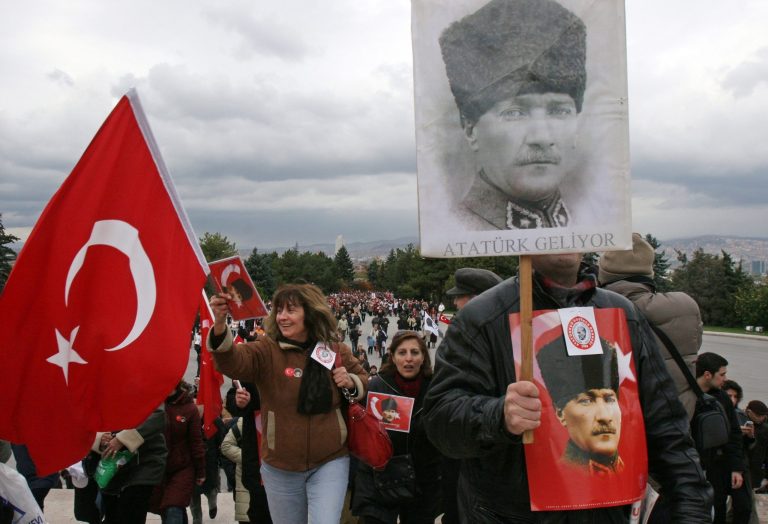   FILE - In this Oct. 29, 2010 file photo, Turkish army generals walk to the mausoleum of Mustafa Kemal Ataturk, founder of modern Turkey, in Ankara, Turkey. These are unsettled times for the Turkish military, once the nation's arbiter. The civilian government gutted its political power, hundreds of retired and active-duty officers are in jail on coup plot charges and now military dissenters are lobbying on Facebook and Twitter for better pay and benefits.(AP Photo/Burhan Ozbilici, File)  
