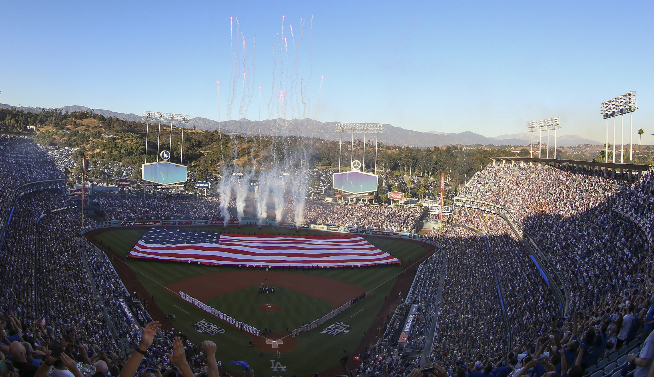 Both teams stand for national anthem at World Series