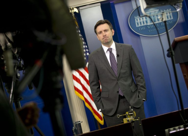 White House press secretary Josh Earnest waits to do a television interview with Fox News in the Brady Press Briefing Room of the White House in Washington, Wednesday, Jan. 7, 2015. (AP Photo/Pablo Martinez Monsivais)