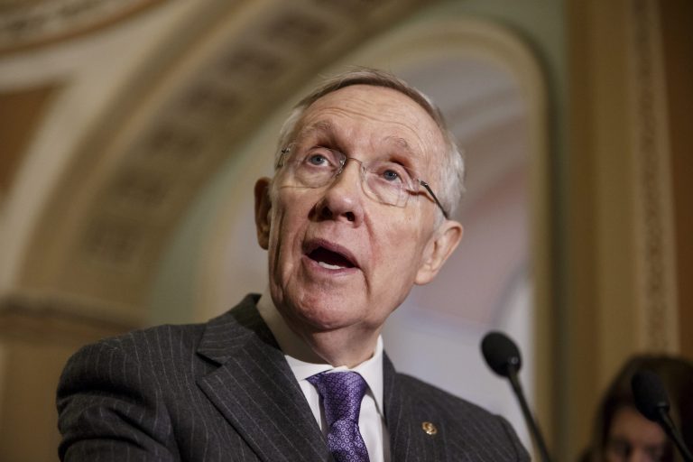 Senate Majority Leader Harry Reid of Nev. faces reporters on Capitol Hill in Washington, Tuesday, Feb. 25, 2014, following a closed-door Democratic policy meeting. The Senate seemed ready Tuesday to vote preliminary approval of a sprawling Democratic bill expanding health, education and other benefits for veterans, but the election-year measure faced conservative opposition and an uncertain fate as Republicans try to make it smaller and find ways to pay for it. (AP Photo/J. Scott Applewhite)