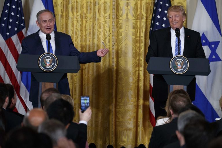 President Donald Trump listens as Israeli Prime Minister Benjamin Netanyahu speaks during their joint news conference Wednesday in the East Room of the White House, in Washington. (AP Photo/Evan Vucci)