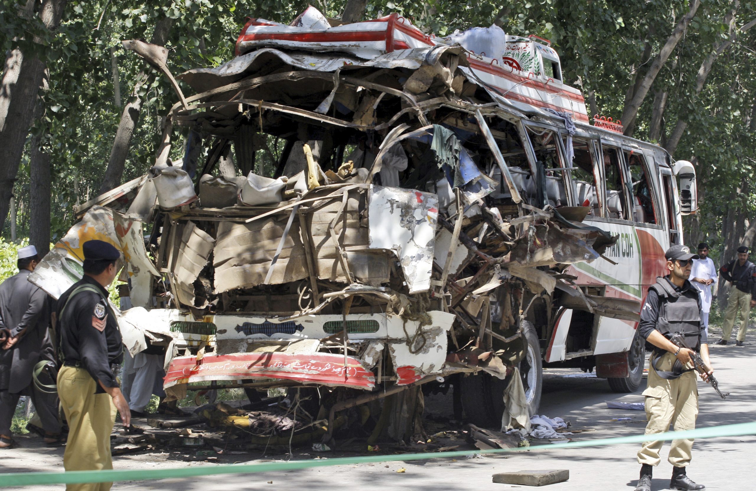 Bomb targeting government bus in Pakistan kills 19