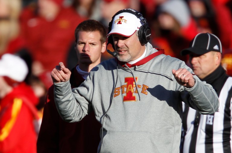   FILE - Iowa State head coach PaulÂ Rhoads directs his players during the first half of an NCAA college football game against West Virginia, in this Nov. 23, 2012 file photo taken in Ames, Iowa. Iowa State might have the best defense no one outside of Ames has heard of this season. The Cyclones held 11 of their 12 opponents below their season scoring average, and half of them at least 10 points under what they normally got. (AP Photo/Matthew Putney, File)  