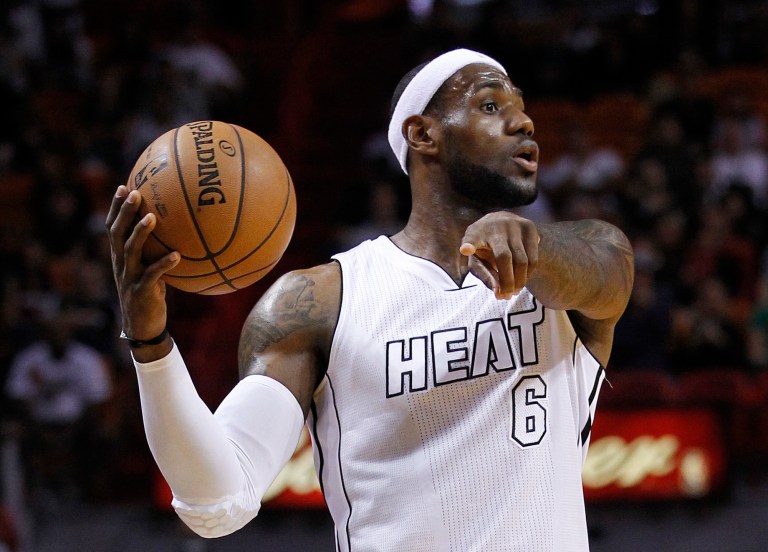   Miami Heat forward LeBron James waits for a teammate to get into position during the first half of an NBA basketball game against the New Orleans Hornets, Saturday, Dec. 8, 2012, in Miami. (AP Photo/Wilfredo Lee)  