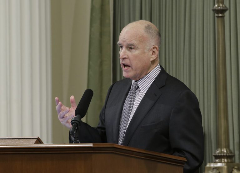 Jerry Brown's administration previously opposed calls for a raise to $15, a stance that has not prevented two groups affiliated with Service Employees International Union from pushing statewide ballot initiative proposals to that effect. (AP Photo)