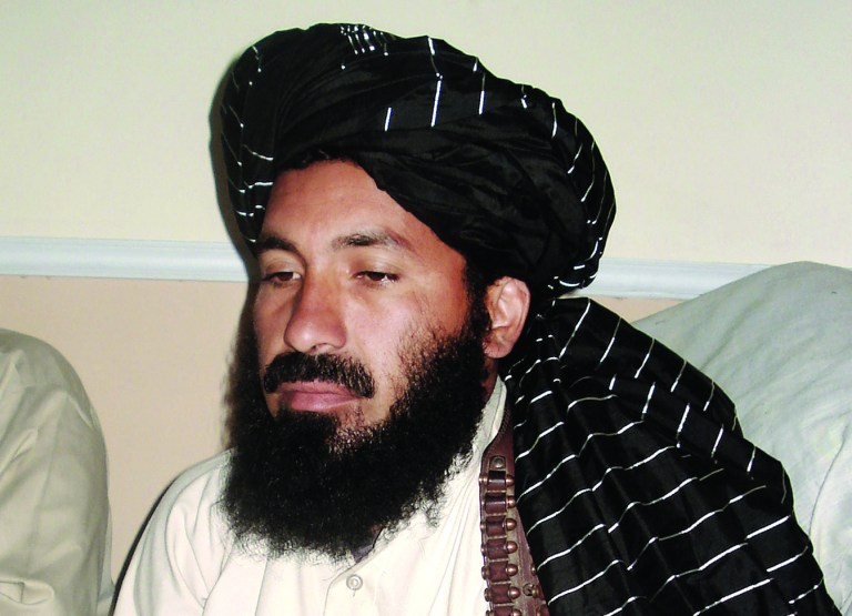 ALTERNATE CROP - In this April, 20, 2007 file photo, Pakistani militant commander Maulvi Nazir meets his associates in South Waziristan, Pakistan near the Afghani border. Five Pakistani security officials said the commander, Nazir, was reportedly among nine people killed in a missile strike on a house in the village of Angoor Adda in the South Waziristan tribal region early Thursday. The officials spoke on condition of anonymity because they were not authorized to brief the media. (AP Photo/Ishtiaq Mahsud)