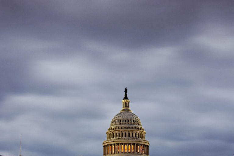 The Capitol in Washington is seen under an overcast sky at dawn, Monday, Oct. 7, 2013.  The government shutdown entered its second week with no end in sight and ominous signs that the United States was closer to the first default in the nation's history as Speaker John Boehner ruled out any measure to boost borrowing authority without concessions from President Barack Obama.  (AP Photo/J. Scott Applewhite)