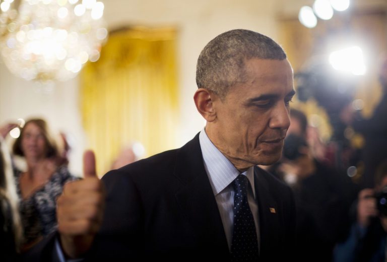President Barack Obama gives a 'thumbs-up' after awarding the National Medals of Science and National Medals of Technology and Innovation, Thursday, Nov. 20, 2014, in the East Room of the White House in Washington. On Thursday night, the president is poised to level broad authority to grant work permits to millions of immigrants living illegally in the US and to protect them from deportation, but the plan would leave the fate of millions more still unresolved. Republicans vowed an all-out fight against it. (AP Photo/Pablo Martinez Monsivais)