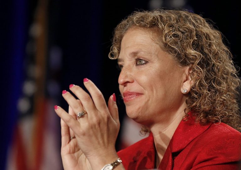 Democratic National Committee Chairwoman Rep. Debbie Wasserman Schultz, D-Fla., applauds another speaker during the party's summer meeting on Aug. 23 in Scottsdale, Ariz. (AP Photo/Ross D. Franklin)