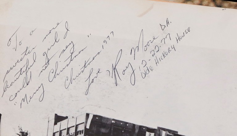 She had actually said that she made her own inscription below Moore's signature, which was dated from 1977, and not that she had forged it. (AP Photo/Richard Drew)