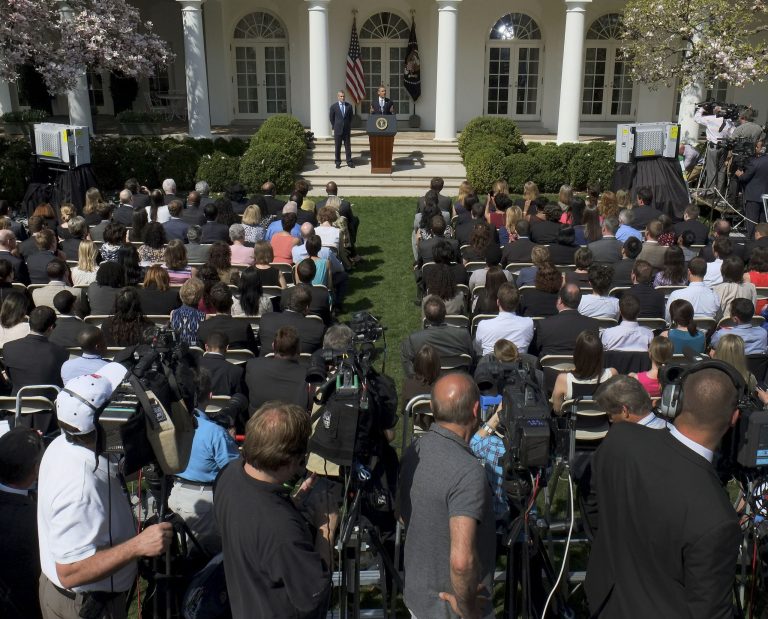 In this photo taken April 10, 2013, President Barack Obama, top center, accompanied acting Budget Director Jeffrey Zients speaks in the Rose Garden at the White House in Washington to discuss his proposed federal budget. Presidents like to take credit for economic recoveries, just as Obama is angling to do now. He and his allies in Congress have 