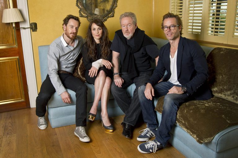   Actors Michael Fassbender, left, Noomi Rapace and Guy Pearce, right, pose for photographs with Director Sir Ridley Scott, at a central London hotel following an interview with the Associated Press for the World Premiere of Prometheus, Saturday, June 2, 2012. (AP Photo/Joel Ryan)  